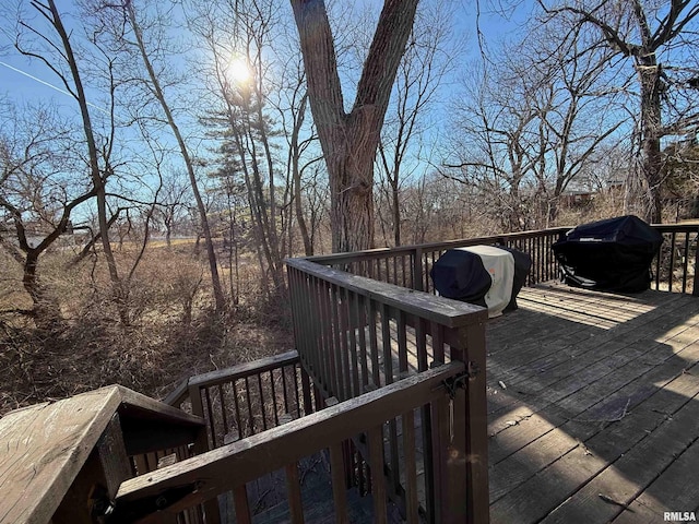 wooden deck with area for grilling