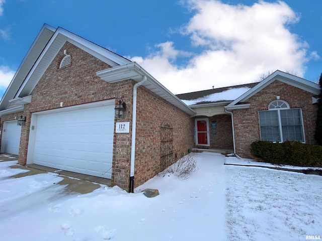 single story home with a garage