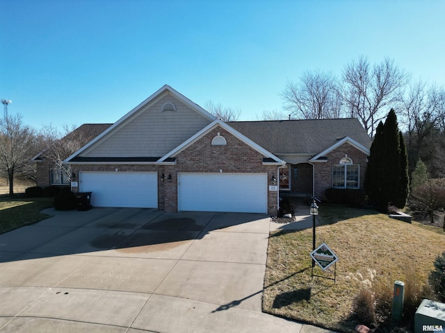 view of front facade with brick siding, driveway, and an attached garage