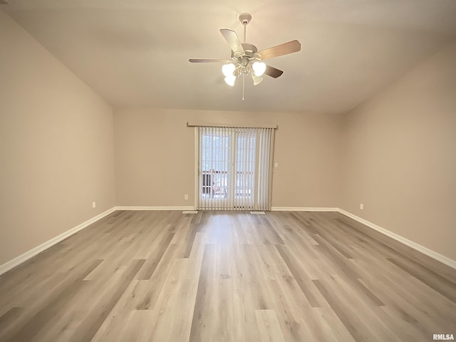 spare room with ceiling fan and light hardwood / wood-style flooring