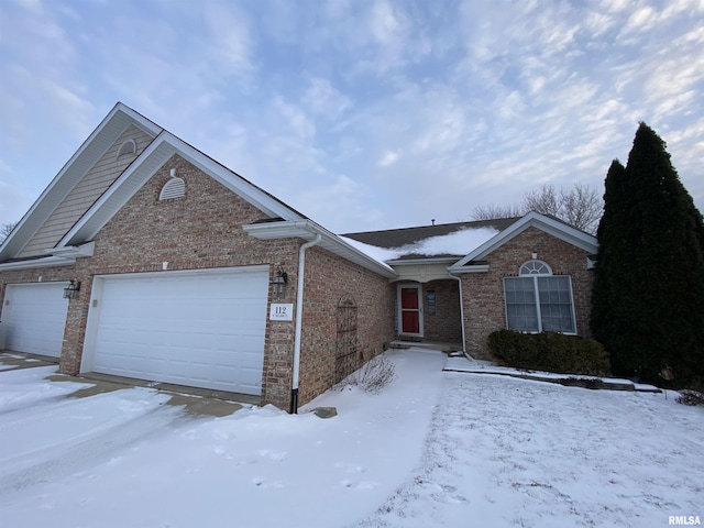 view of front of property with a garage