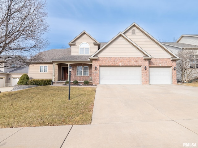 view of front facade with a front lawn and a garage