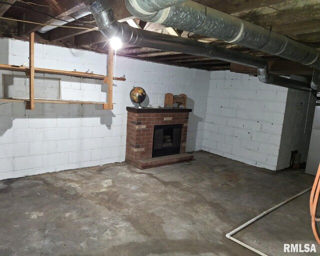 300 E 4th St, Saint David, IL 61563 - unfinished basement with concrete block wall and a brick fireplace