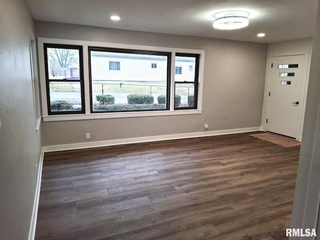 300 E 4th St, Saint David, IL 61563 - empty room with recessed lighting, baseboards, and dark wood-type flooring
