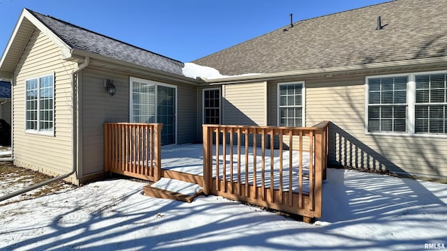 view of snow covered deck