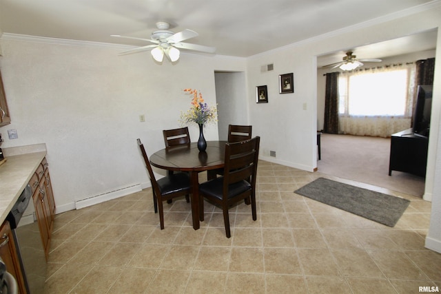 dining area with baseboards, a baseboard heating unit, and crown molding