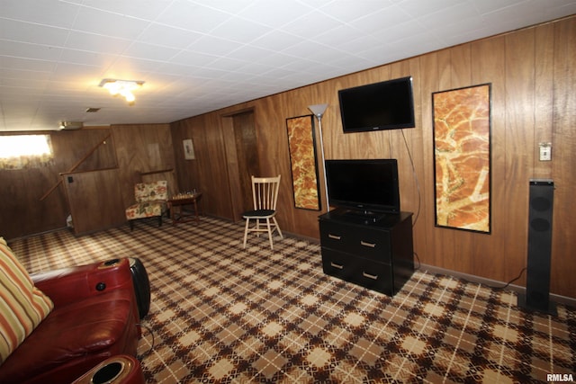 sitting room with wood walls