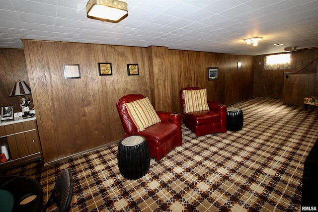 sitting room with wood walls