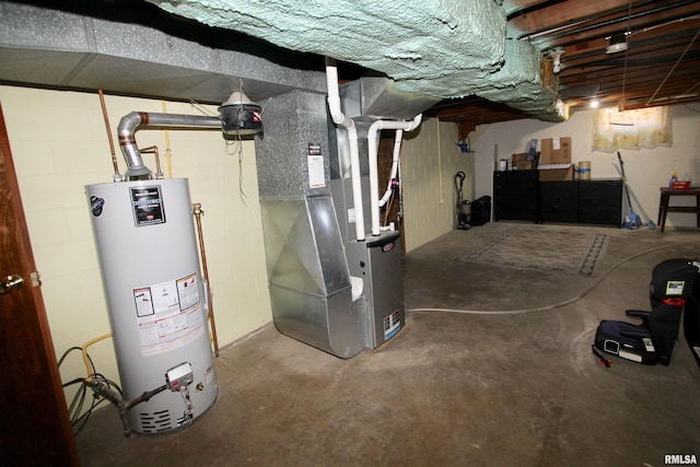 interior space featuring water heater and heating unit