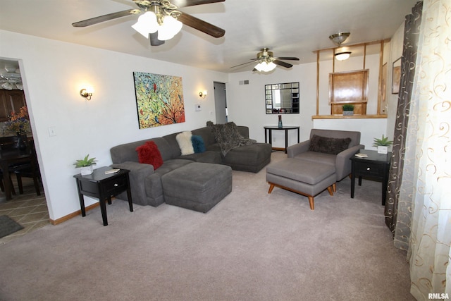 living area with carpet floors, visible vents, and baseboards