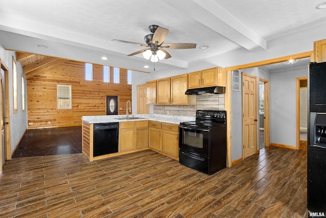 kitchen with under cabinet range hood, a sink, light countertops, light brown cabinetry, and black appliances