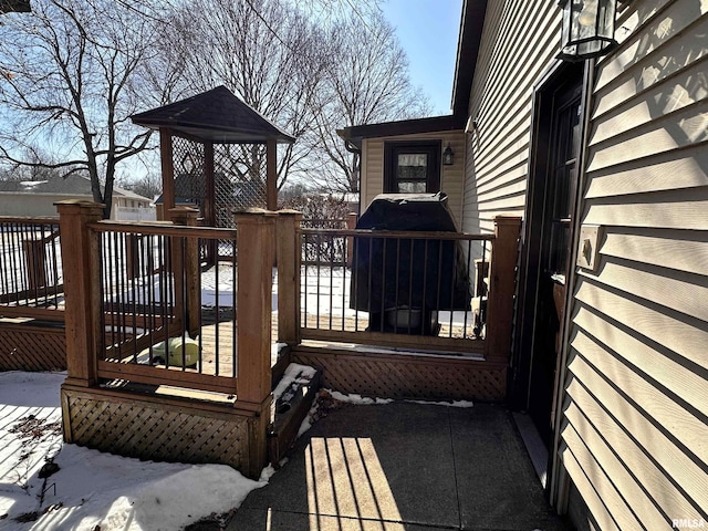 view of snow covered deck