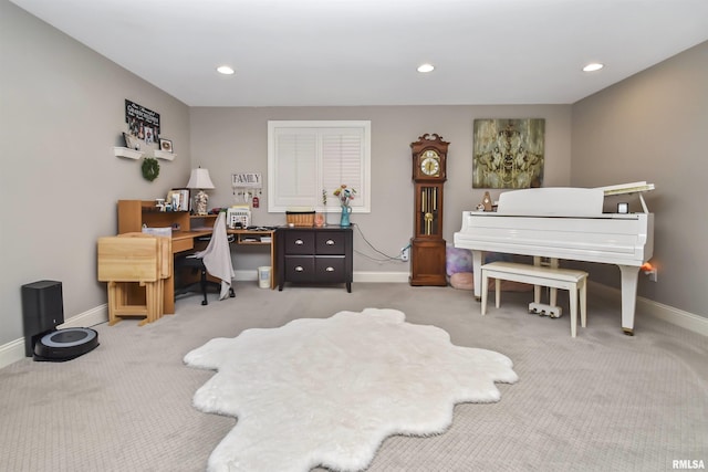 office space with recessed lighting, light colored carpet, and baseboards