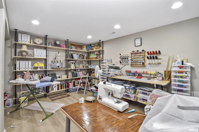 interior space with visible vents, wood finished floors, and recessed lighting