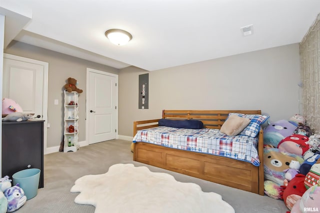 bedroom featuring light carpet, visible vents, and baseboards