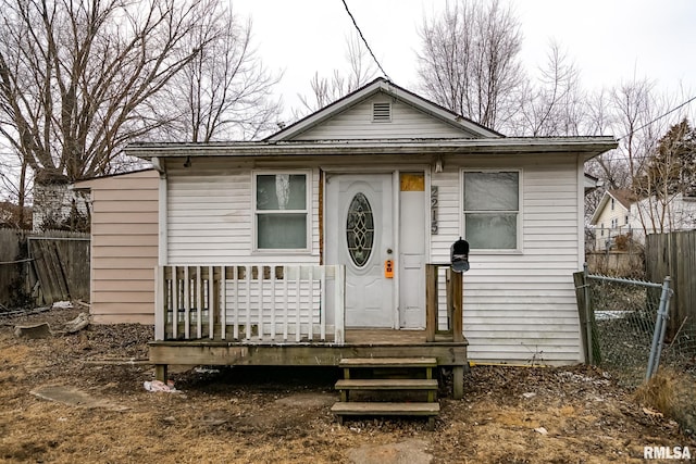 view of front of house with fence