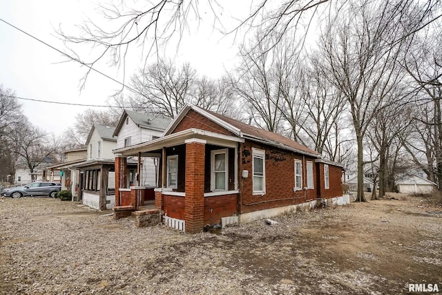 view of home's exterior featuring brick siding