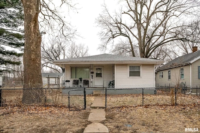 bungalow-style home featuring a fenced front yard, a gate, and a porch