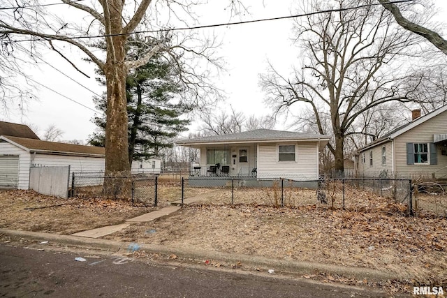 view of front of home featuring a fenced front yard and a porch