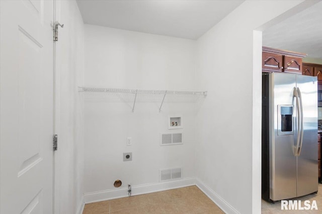 washroom with laundry area, visible vents, gas dryer hookup, hookup for a washing machine, and hookup for an electric dryer