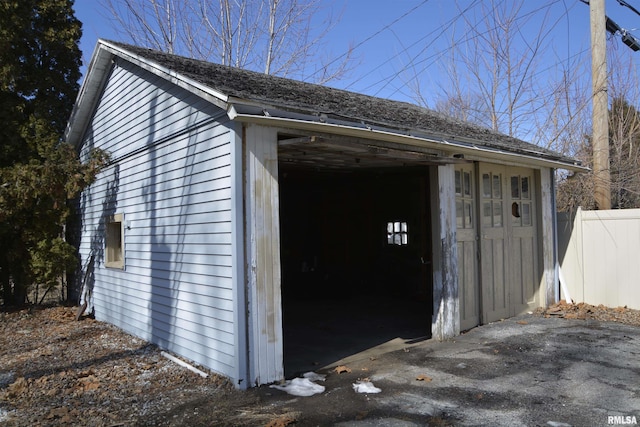 644 S Randolph St, Macomb, IL 61455 - garage featuring fence
