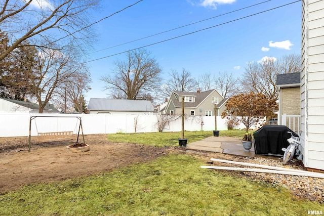 view of yard with a patio and a fenced backyard