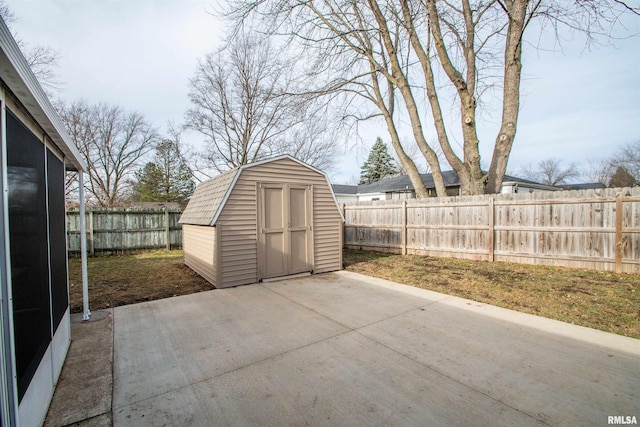 view of shed featuring a fenced backyard