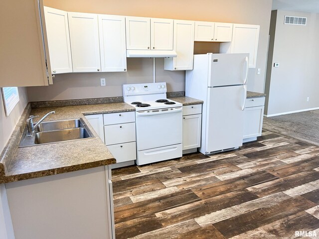 kitchen with under cabinet range hood, white appliances, a sink, white cabinetry, and visible vents