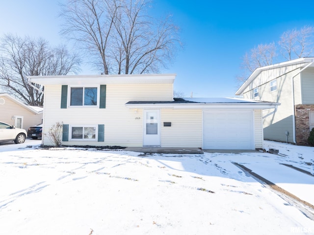 split level home with a garage