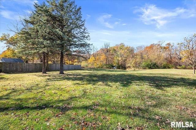 view of yard featuring fence