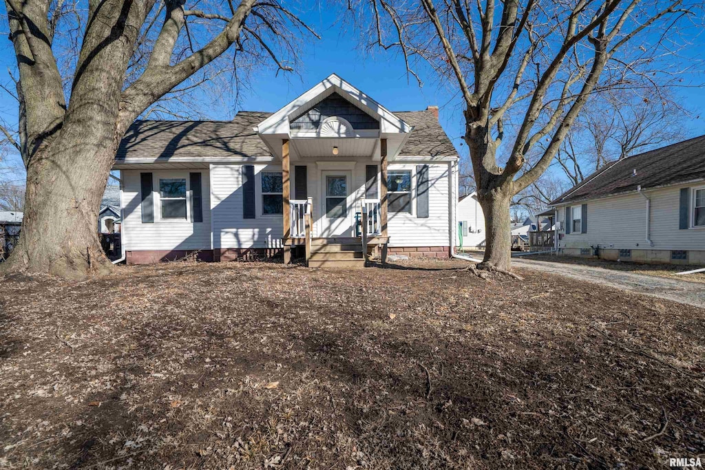 view of front of home with roof with shingles