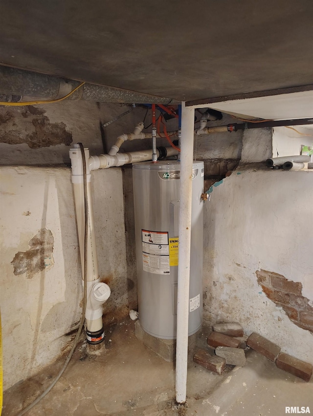 utility room featuring electric water heater