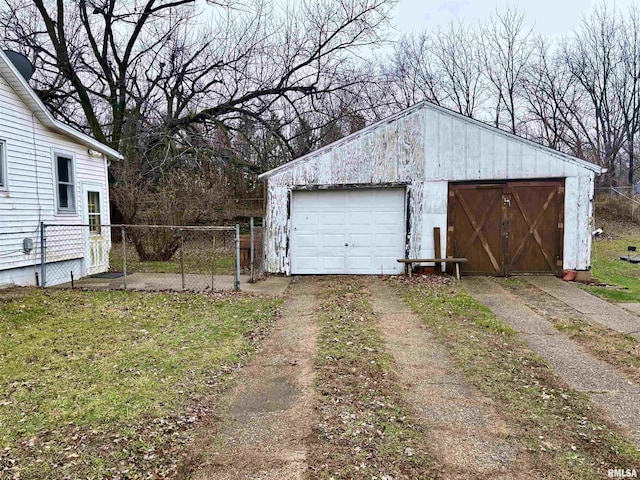 detached garage with fence