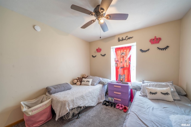 bedroom with ceiling fan and carpet flooring