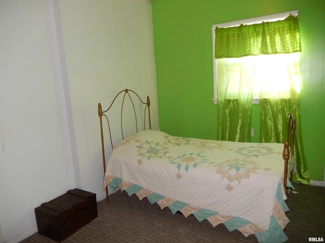 bedroom featuring carpet