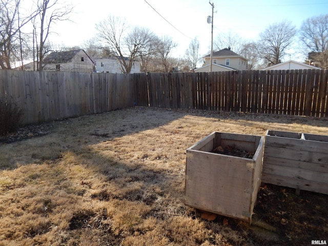 view of yard featuring a fenced backyard