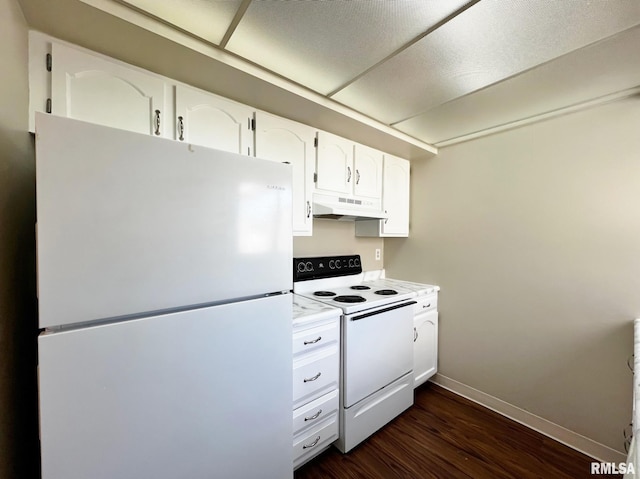 kitchen featuring under cabinet range hood, white appliances, white cabinets, light countertops, and dark wood finished floors