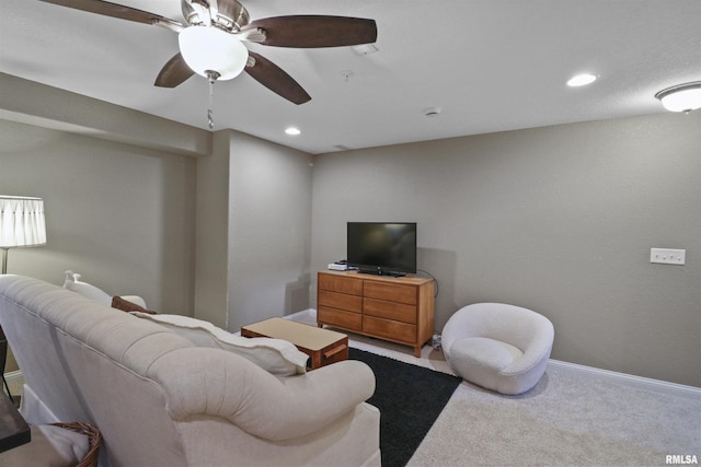 living area with carpet floors, recessed lighting, baseboards, and a ceiling fan