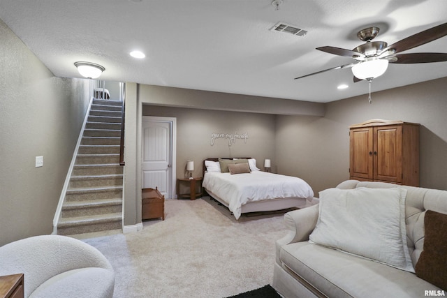 bedroom with recessed lighting, light colored carpet, visible vents, ceiling fan, and baseboards