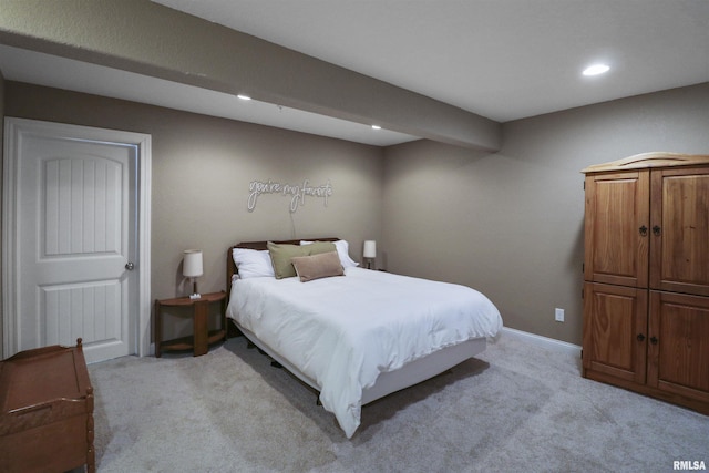 bedroom with recessed lighting, baseboards, and light colored carpet