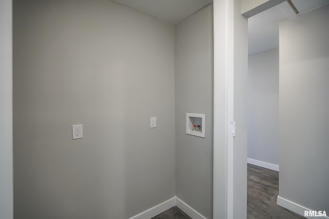 washroom featuring laundry area, baseboards, washer hookup, and dark wood finished floors