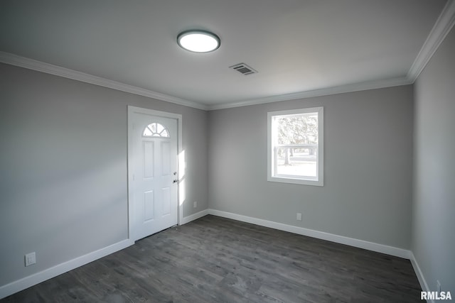 entryway with dark wood-style floors, visible vents, crown molding, and baseboards