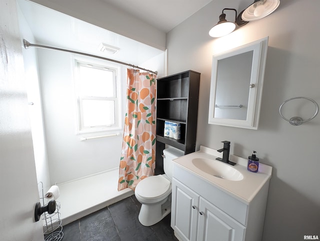 full bathroom with vanity and toilet