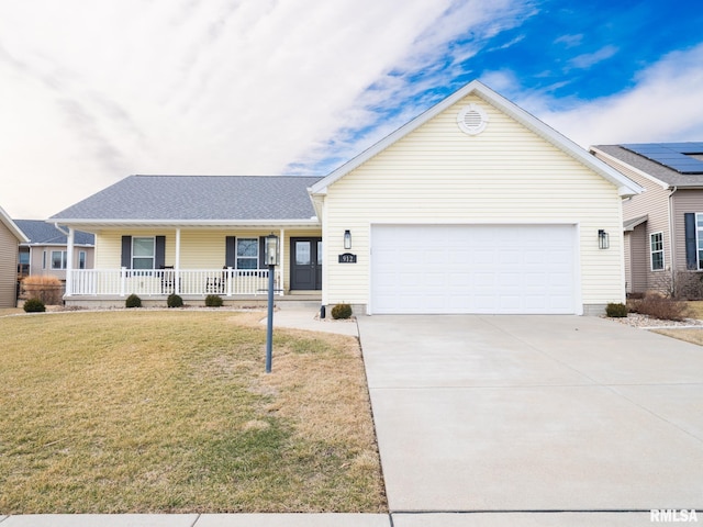 single story home with a porch, a front yard, driveway, and a garage