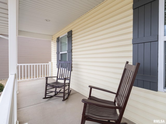 balcony featuring a porch