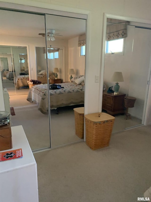 carpeted bedroom with a closet