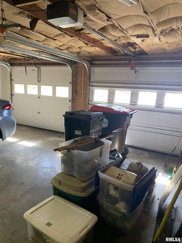 garage featuring a garage door opener