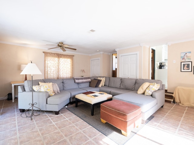 living area with ceiling fan and ornamental molding