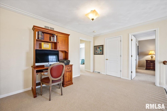 office featuring ornamental molding, light colored carpet, visible vents, and baseboards