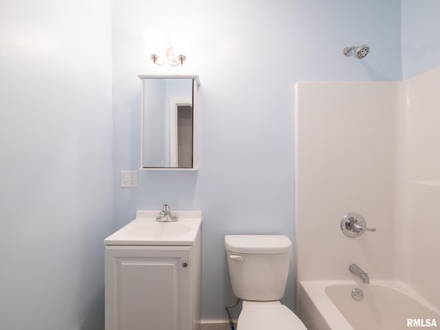 full bathroom featuring shower / bath combination, vanity, and toilet